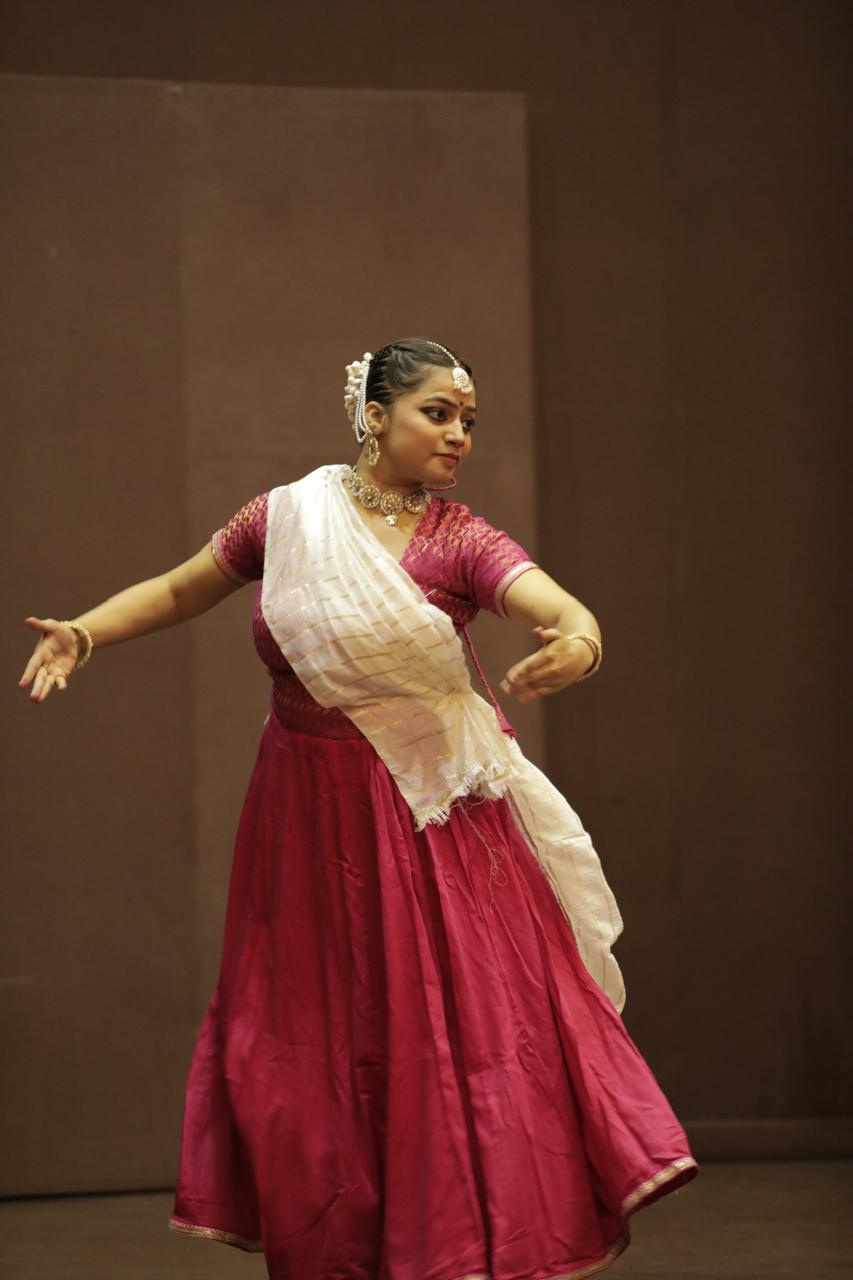 Aditi Vasistha — crimson costume performance